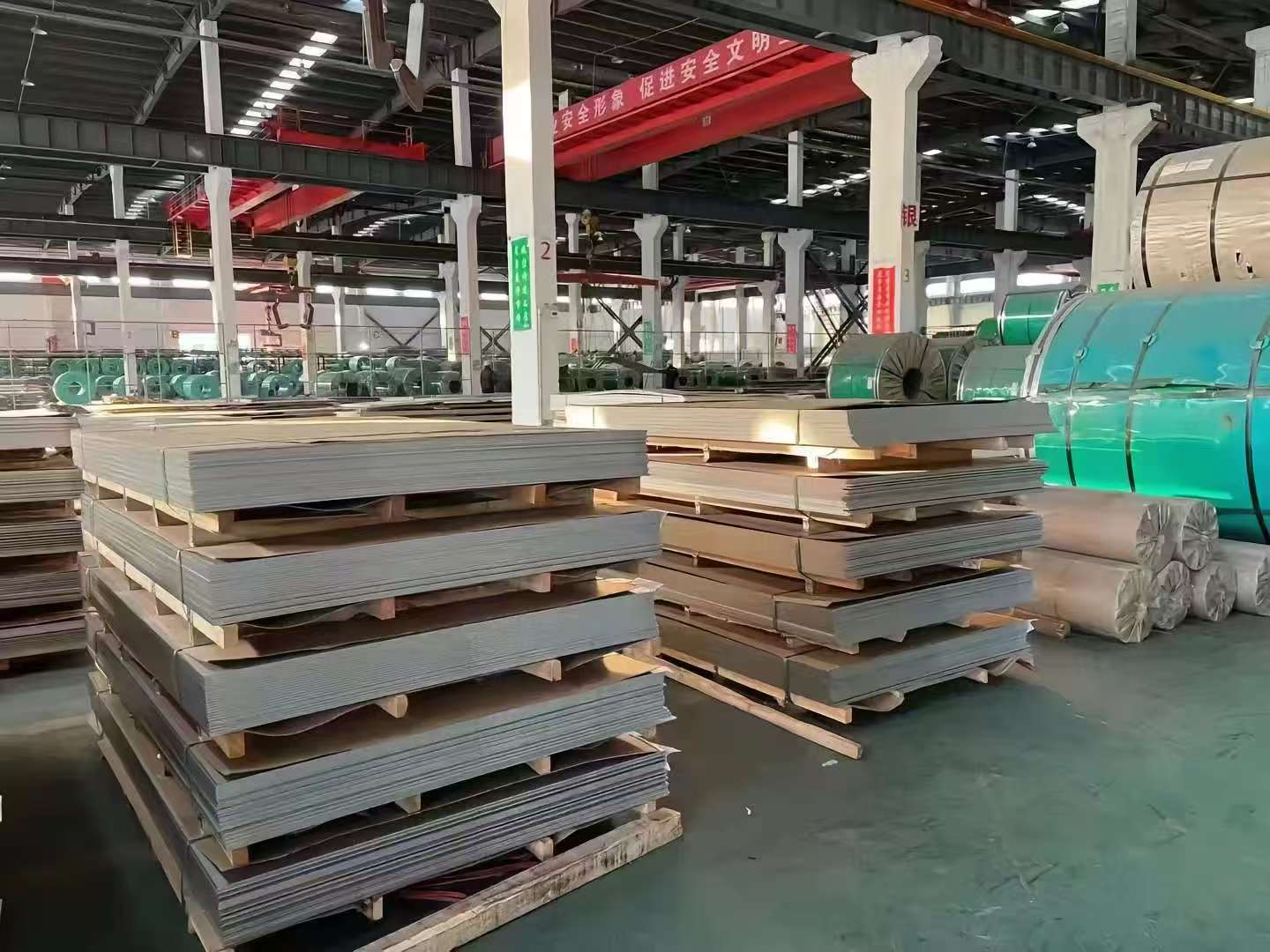 304 stainless steel plate stock in a factory warehouse