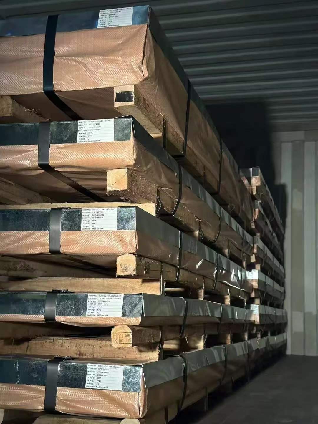 Packaged stainless steel plates with labels for export review